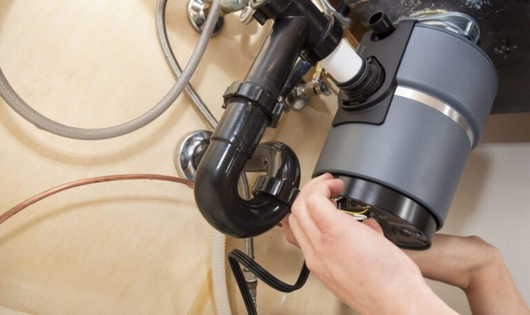 Garbage Disposal Repair clearwater plumber fixing kitchen disposal